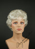 Style #511 - An Elegant Wig!  Short, close, softly permed roller set look with unique fluff-up nape area.